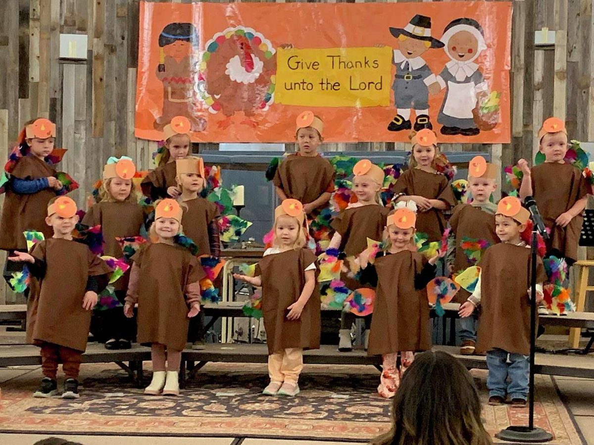 Children present their Thanksgiving Gathering on Tuesday morning inside the Fellowship Hall at “In His Hands” pre-school at First Methodist.