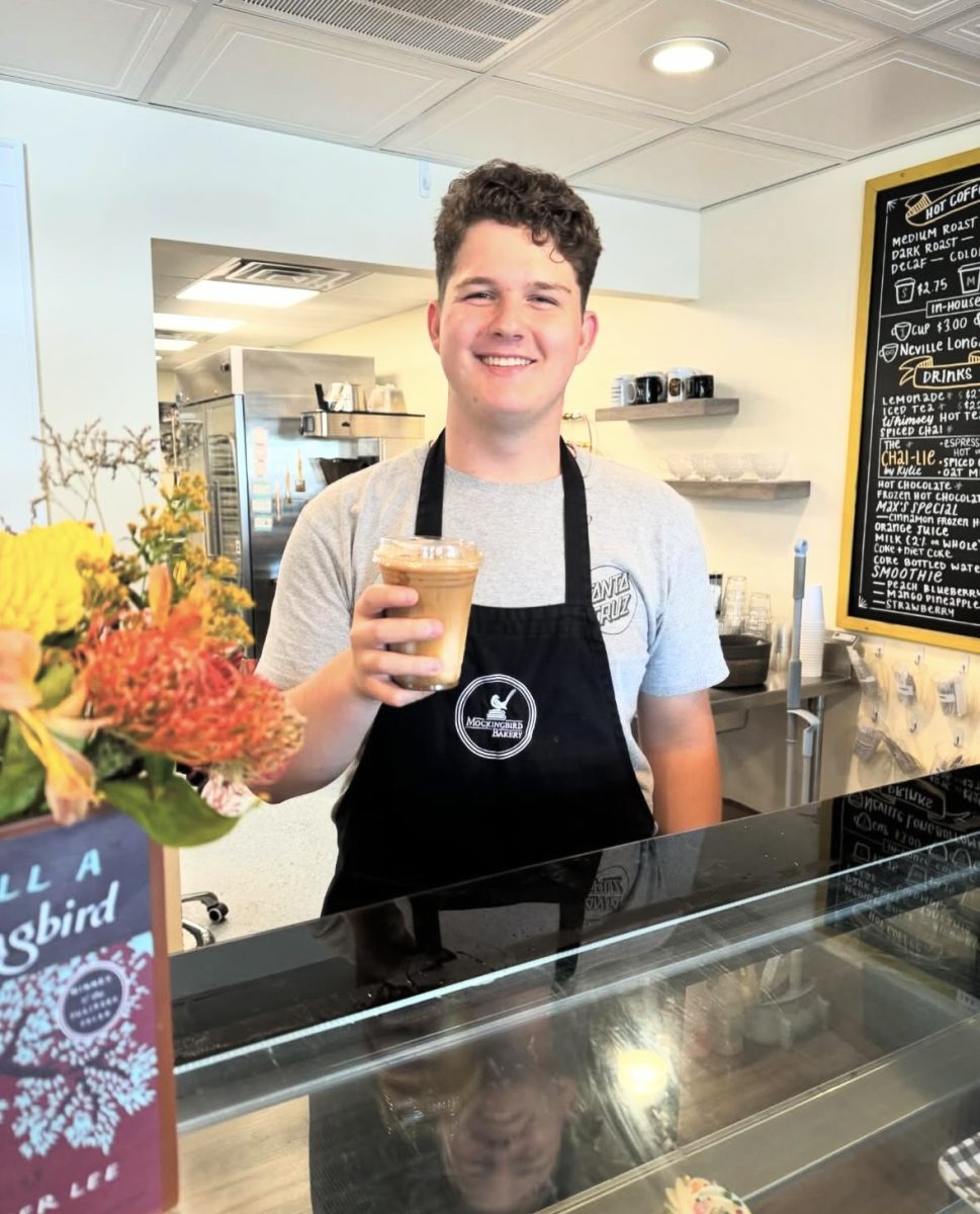 Mason with a coffee he made after newly starting at Mockingbird. He loves his new job and manages it easier only having to work a couple times a week. 

