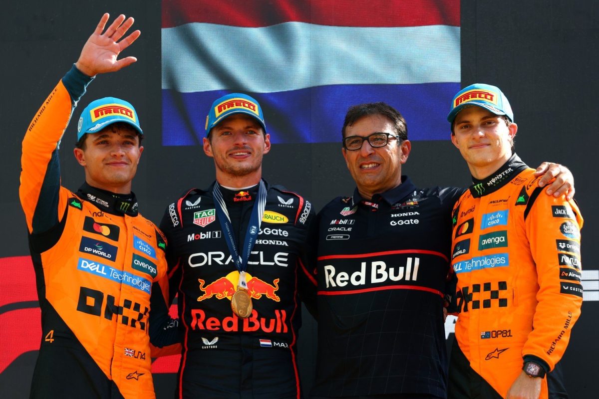 MONZA, ITALY - SEPTEMBER 07: Race winner Max Verstappen of the Netherlands and Oracle Red Bull Racing Second placed Lando Norris of Great Britain and McLaren Third placed Oscar Piastri of Australia and McLaren and Pierre Wache, Technical Director of Oracle Red Bull Racing on the podium during the F1 Grand Prix of Italy at Autodromo Nazionale Monza on September 07, 2025 in Monza, Italy. (Photo by Clive Rose/Getty Images) // Getty Images / Red Bull Content Pool 